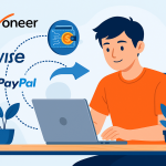 Asian freelancer using laptop to receive payments via Payoneer, Wise, and PayPal